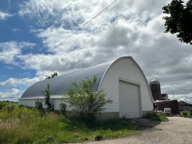 view of outdoor structure with a garage