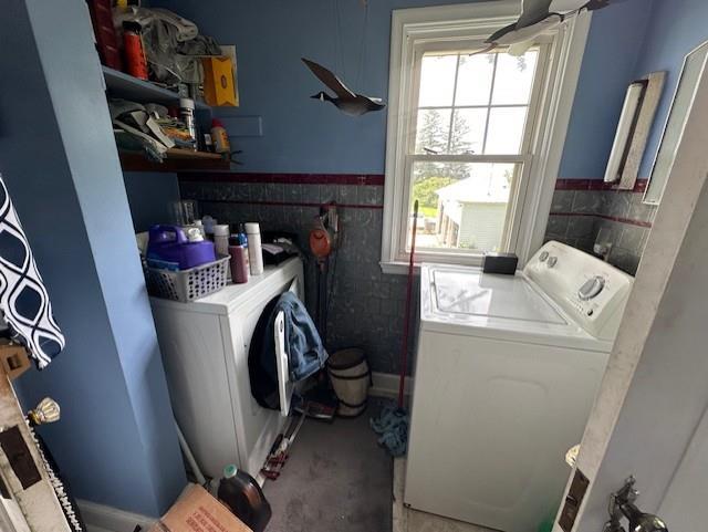 laundry room with washer and clothes dryer