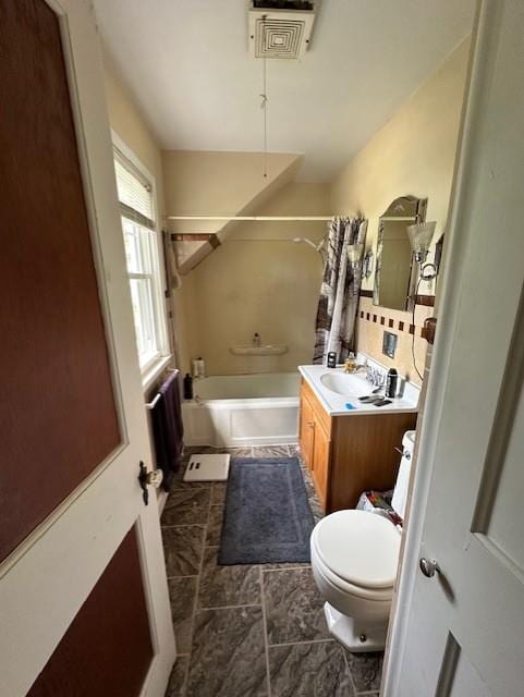 full bathroom with backsplash, toilet, tile patterned flooring, vanity, and shower / bath combination with curtain