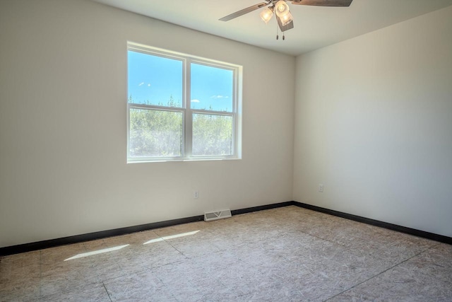 spare room featuring ceiling fan