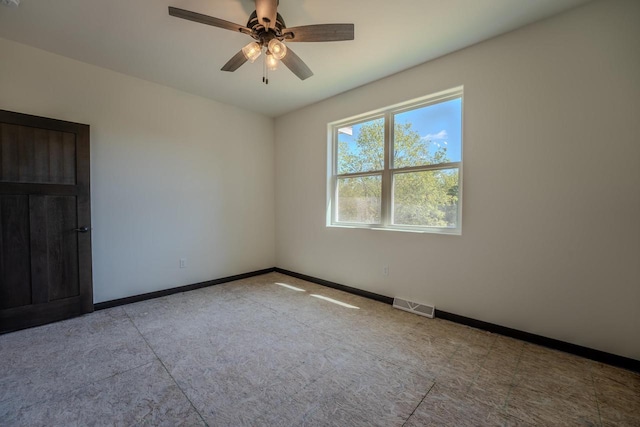 empty room with ceiling fan