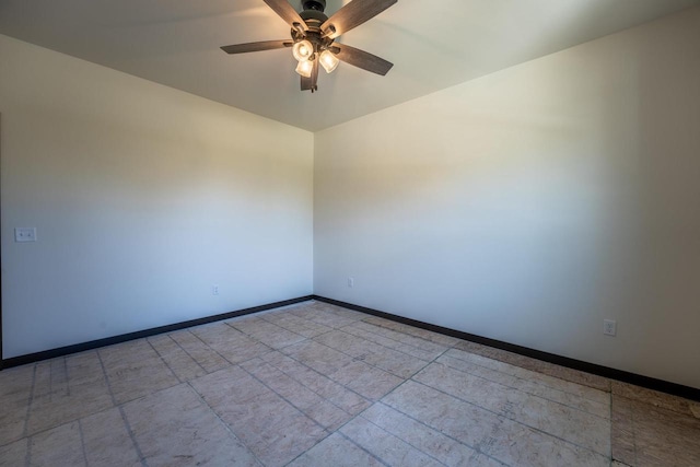 spare room with light tile patterned floors and ceiling fan