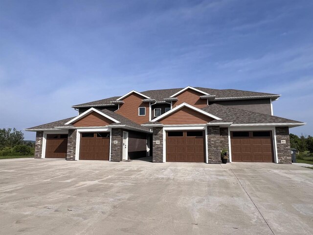 craftsman inspired home featuring a garage