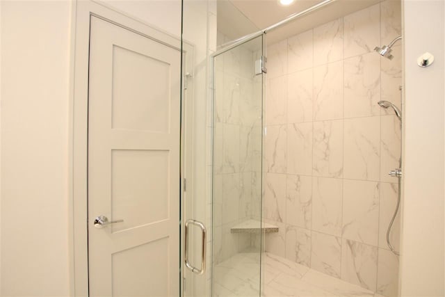 full bathroom featuring a shower stall