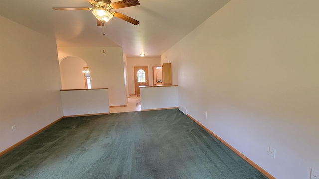 interior space with ceiling fan and carpet floors