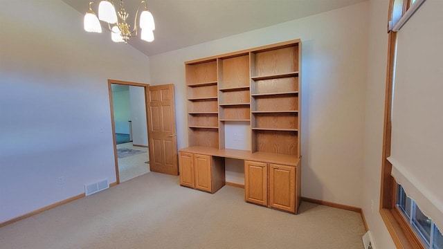 unfurnished office with light carpet and an inviting chandelier