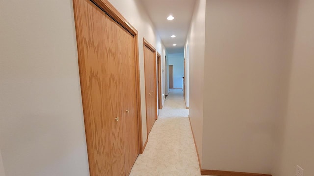 hallway with carpet