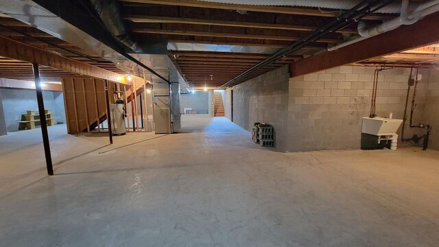 basement with sink and water heater