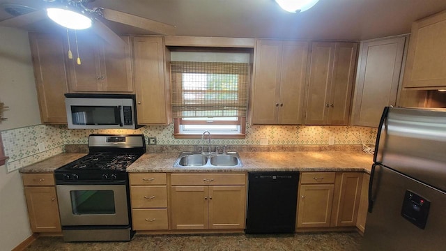 kitchen with tasteful backsplash, appliances with stainless steel finishes, light countertops, light brown cabinetry, and a sink