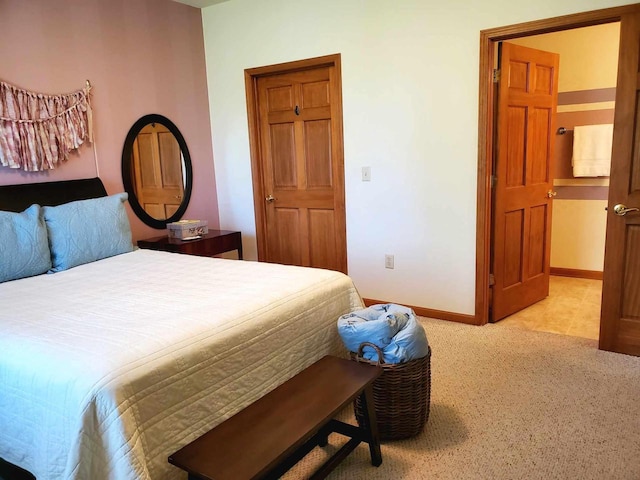 bedroom featuring light tile patterned floors