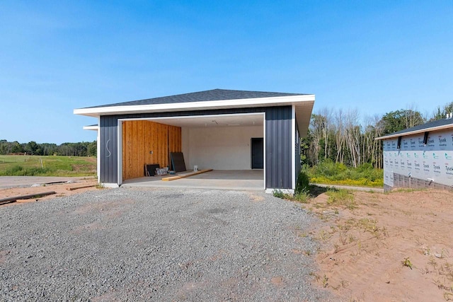 garage with a carport