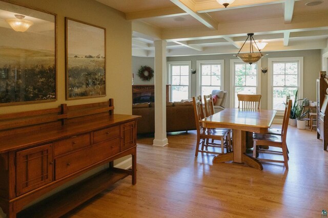 34780 S County Highway J, Bayfield, WI 54814 - dining room featuring light wood-type flooring, a fireplace, coffered ceiling, and beamed ceiling