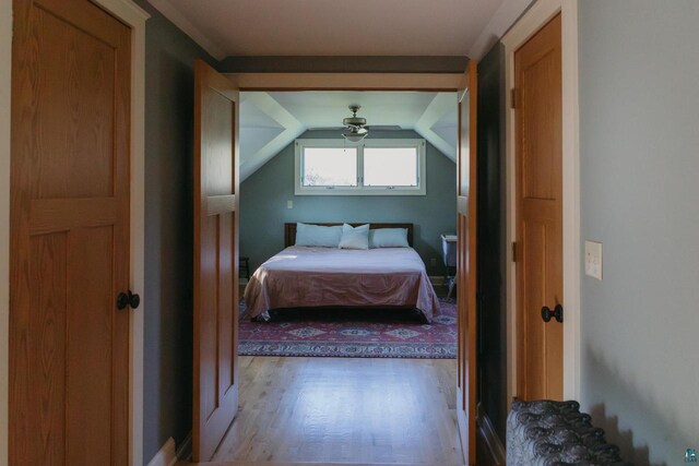 34780 S County Highway J, Bayfield, WI 54814 - bedroom with vaulted ceiling and wood finished floors