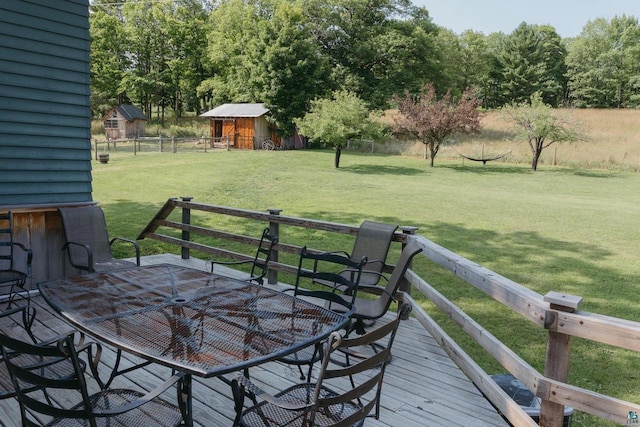 34780 S County Highway J, Bayfield, WI 54814 - wooden deck featuring outdoor dining space, a yard, and fence