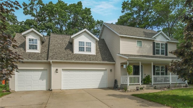 view of front of home with a garage and covered porch