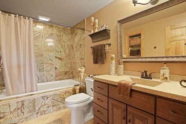 full bathroom featuring tile patterned floors, toilet, a textured ceiling, vanity, and shower / tub combo