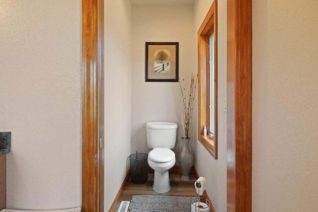 bathroom featuring toilet