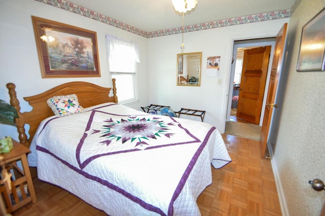 bedroom featuring baseboards