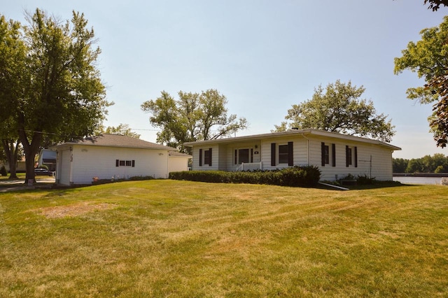 ranch-style house with a front yard