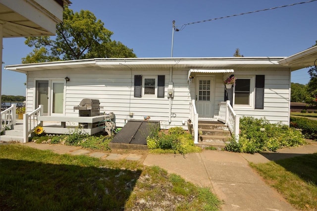 exterior space featuring a yard and a deck