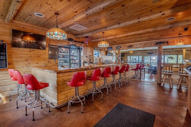 bar with beam ceiling, wooden ceiling, and decorative light fixtures