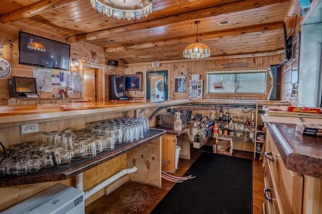 kitchen featuring wood counters, wooden walls, wooden ceiling, hardwood / wood-style flooring, and decorative light fixtures