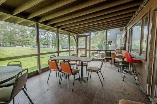 sunroom / solarium featuring a wealth of natural light