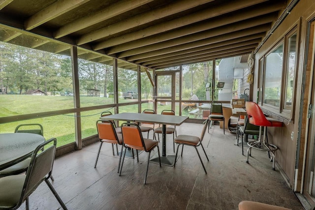 sunroom / solarium featuring plenty of natural light