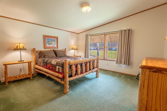 bedroom with carpet flooring, vaulted ceiling, and ornamental molding