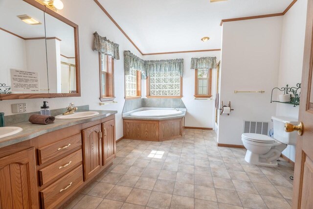 full bathroom with a bath, a sink, visible vents, and crown molding