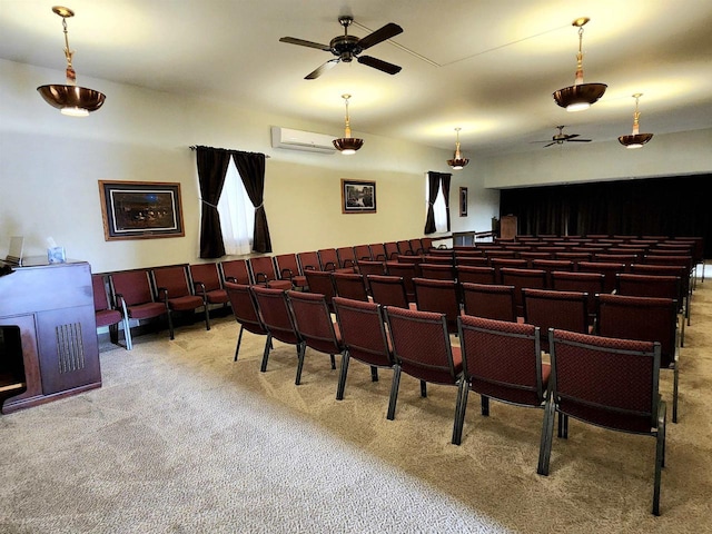 cinema with a wall mounted air conditioner, carpet, and ceiling fan