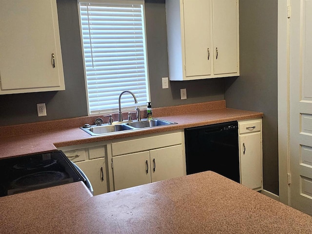 kitchen featuring a sink, black dishwasher, electric range oven, white cabinetry, and light countertops