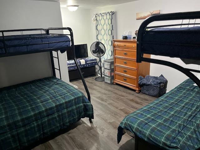 bedroom featuring wood-type flooring