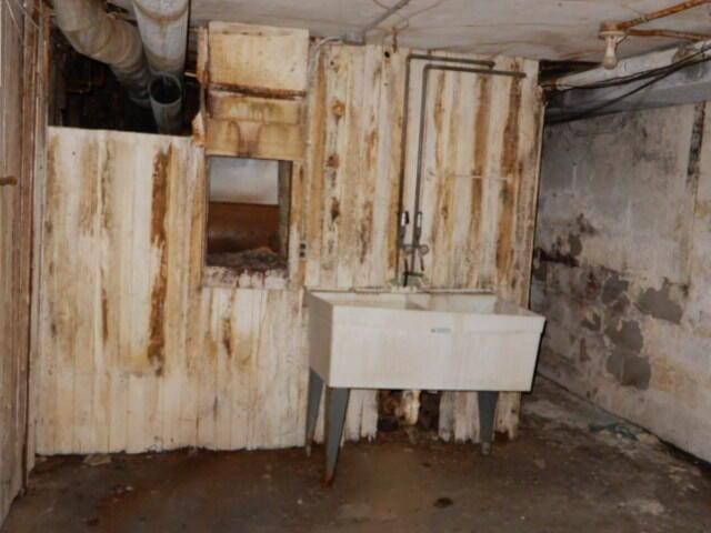 unfinished basement with a sink