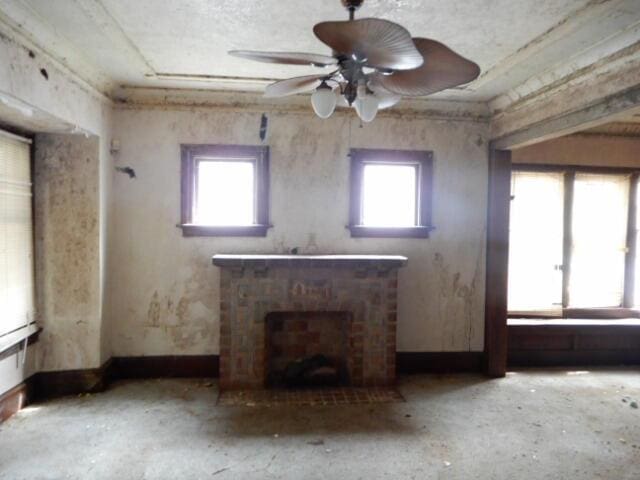 unfurnished living room with a brick fireplace