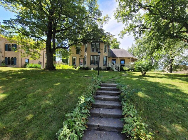 view of front of home with a front yard