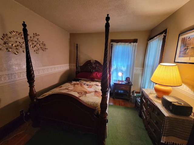 bedroom featuring a textured ceiling