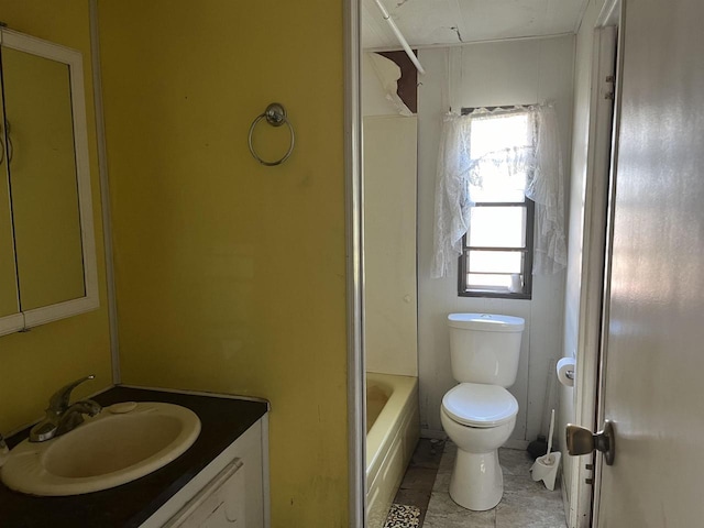 N9185 9th Ave, New Lisbon, WI 53950 - full bath with toilet, vanity, and bathtub / shower combination
