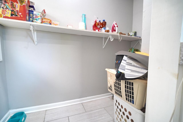 washroom featuring light tile patterned flooring