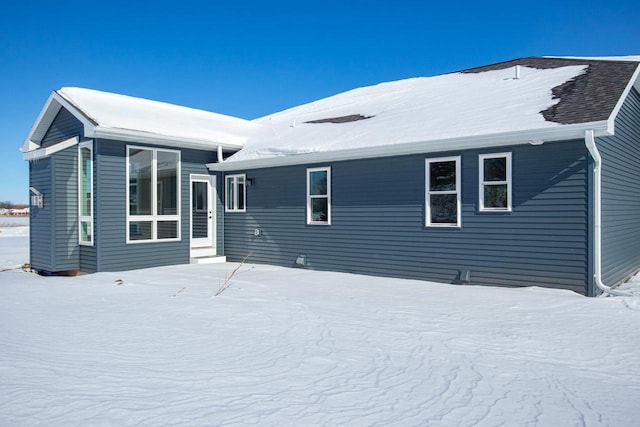 view of snow covered property