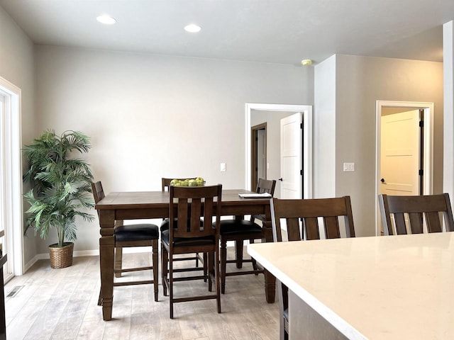 dining area featuring light hardwood / wood-style flooring