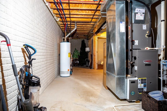 utility room with water heater and heating unit