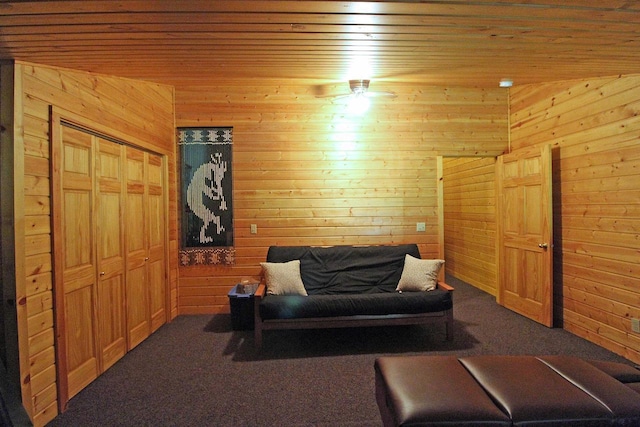 7750 Pine Rd, Arena, WI 53503 - living area with carpet flooring, wood walls, and wood ceiling