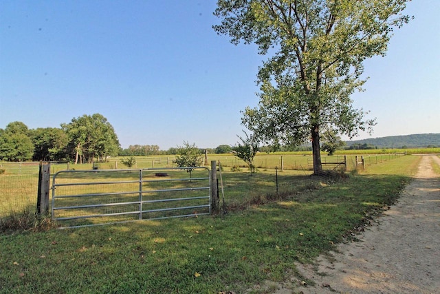 7750 Pine Rd, Arena, WI 53503 - exterior space featuring a lawn, fence, and a rural view