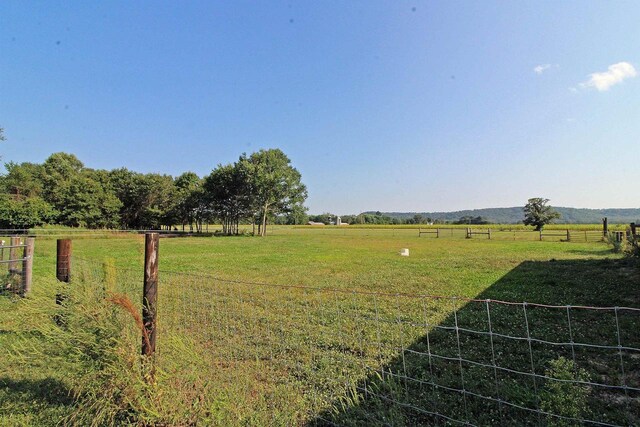 7750 Pine Rd, Arena, WI 53503 - view of yard with fence and a rural view