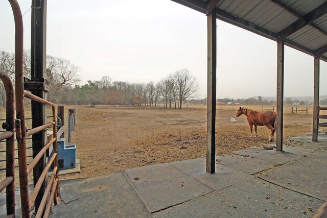 7750 Pine Rd, Arena, WI 53503 - view of yard featuring an exterior structure, an outdoor structure, and a rural view