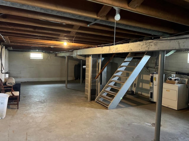 basement featuring washer / dryer and water heater