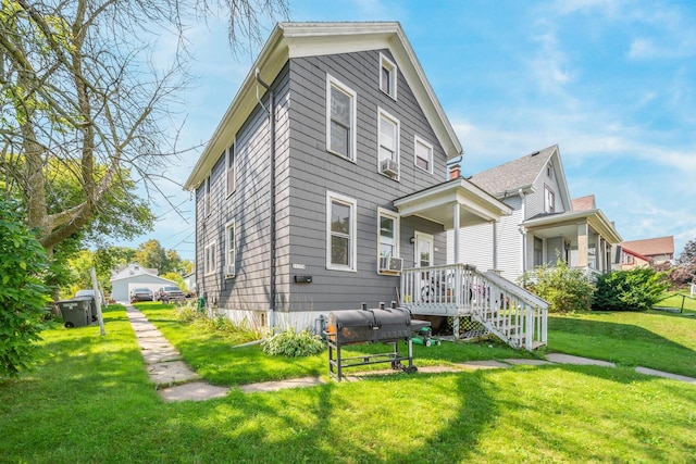 exterior space with cooling unit and a lawn