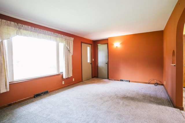 empty room featuring carpet flooring