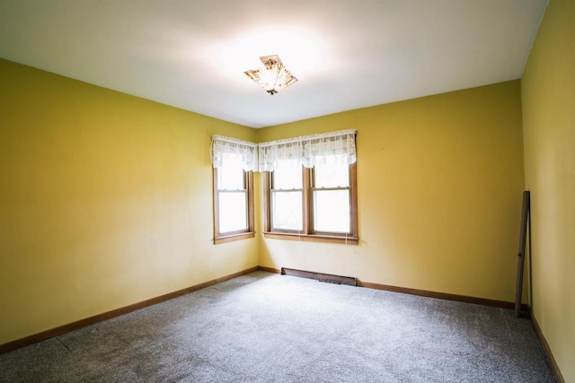 unfurnished room with carpet floors